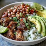 Fresh salsa, creamy avocado slices, and chopped cilantro add bright color and zesty flavor to the meal.