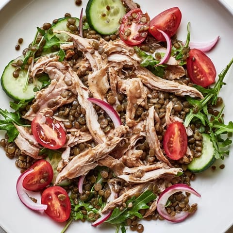 Protein-packed Lentil & Chicken Spring Salad with peppery greens, tangy onions, and a light mustard vinaigrette, perfect for a healthy lunch.  
